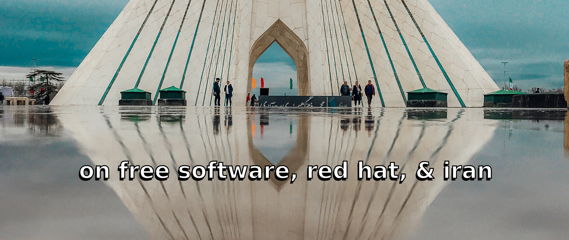 Subtitled, "on Free Software, Red Hat, and Iran". The Azadi Tower in Tehran, Iran appears in the background.